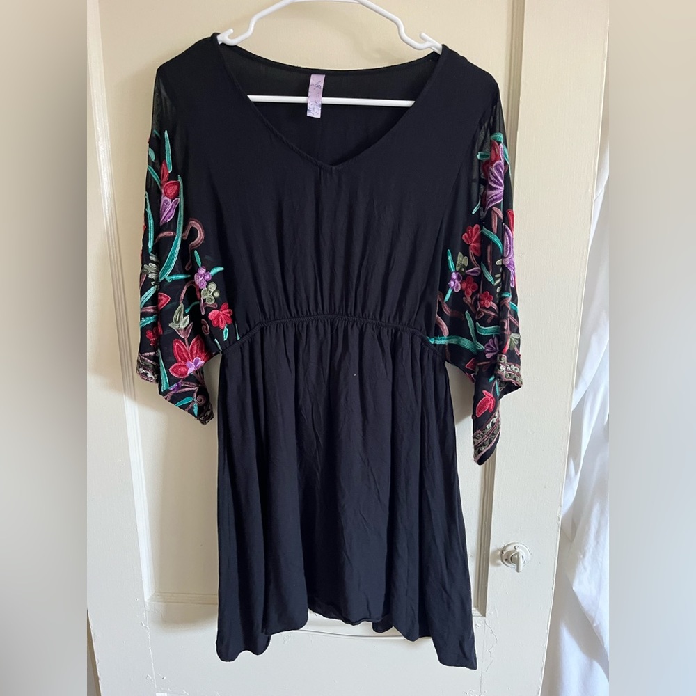 Embroidered sleeve black dress